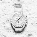 White chronograph men's wristwatch with tachymeter bezel on textured sandy background